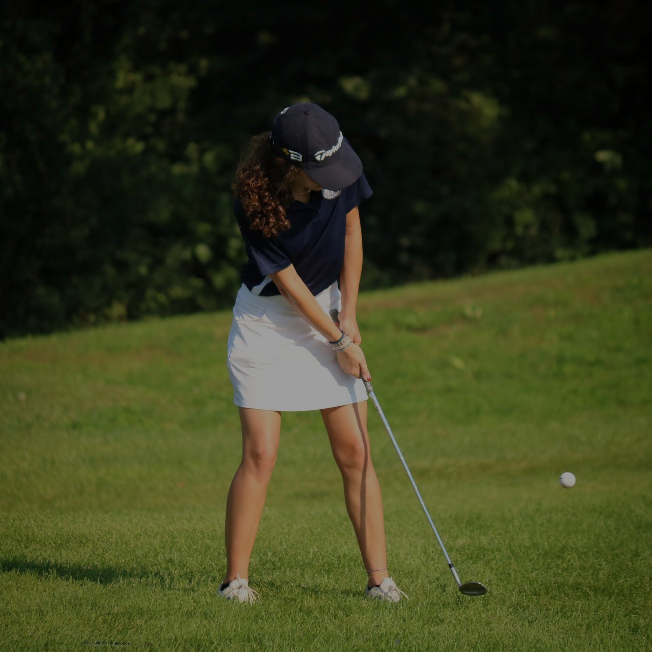 Napsütötte golfpálya játék közben